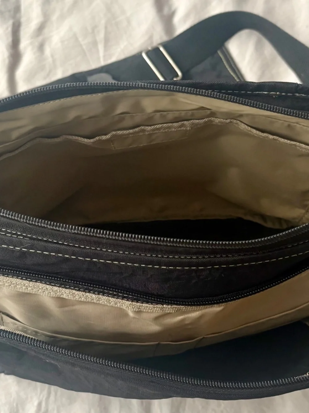 Inside NY unisex messenger bag.